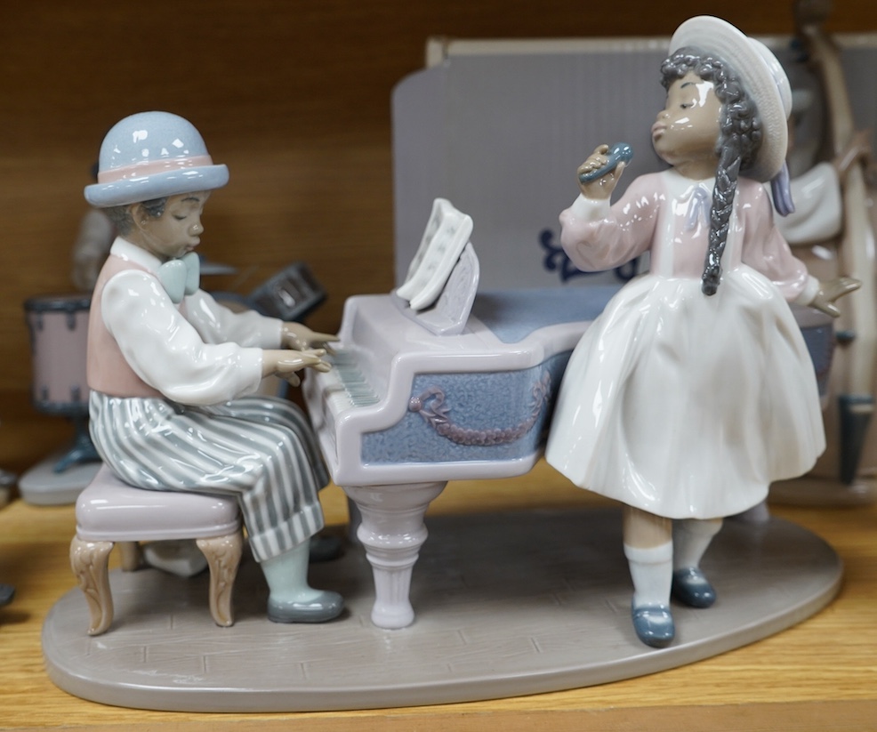 A Lladro group of six ‘Jazz Band’ figures, tallest 25cm. Condition - good